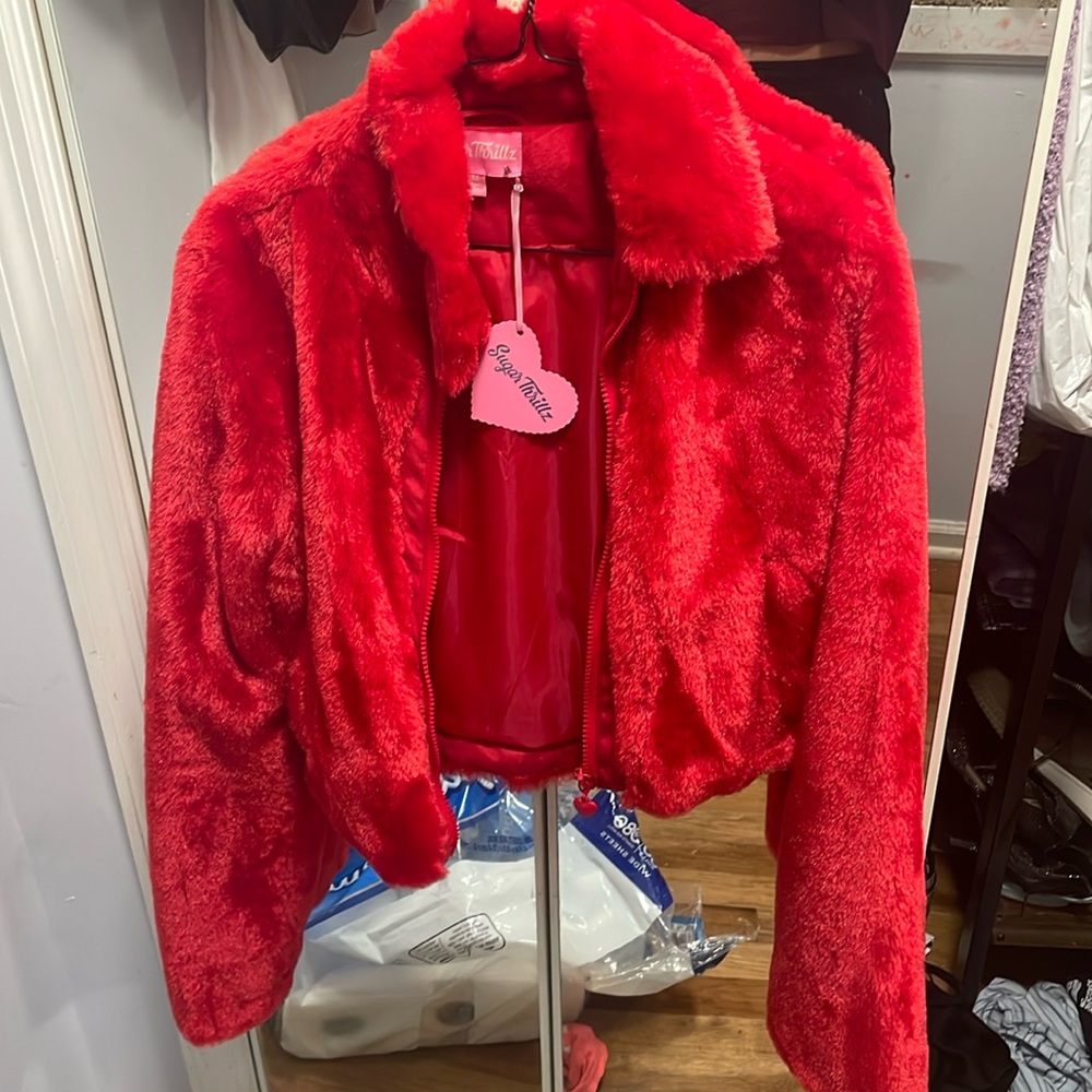Red cute sugar thrills jacket never worn and never used practically new